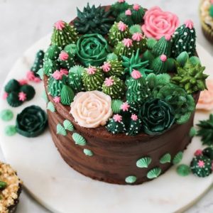 Chocolate Cake with Diverse Flower Arrangement