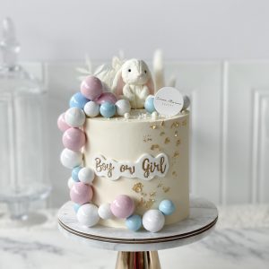 White Bunny Cake with Blue and Pink Spheres