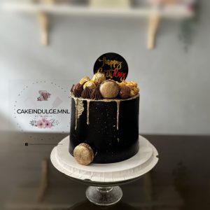 Ferrero Rocher Cake with Golden Macarons